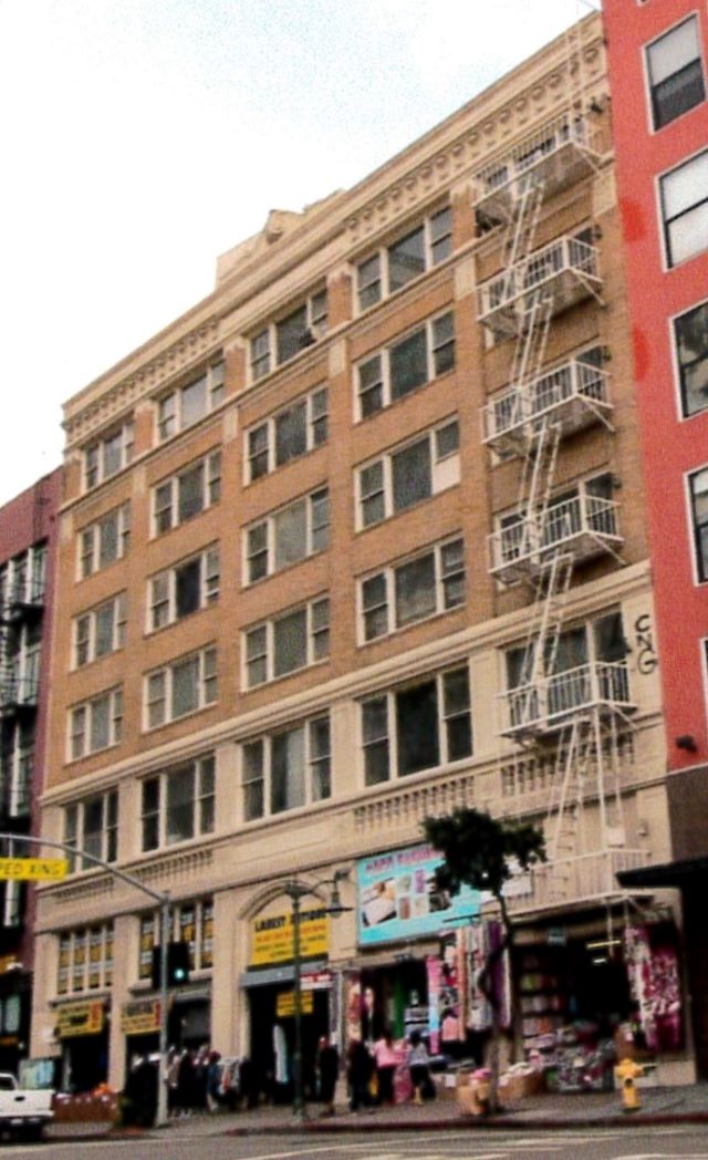 Before: Rear facade of the Grether & Grether Building before rehabilitation.